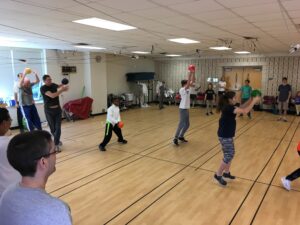 Parents & kids warm-up together for fencing Parents & kids warm-up together for fencing